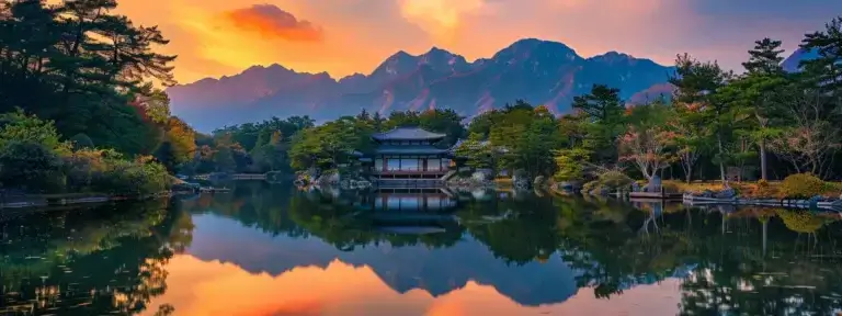 a serene landscape unfolds at dusk, where a vibrant sunset casts golden hues over a tranquil lake, reflecting the silhouetted mountains that frame the scene.