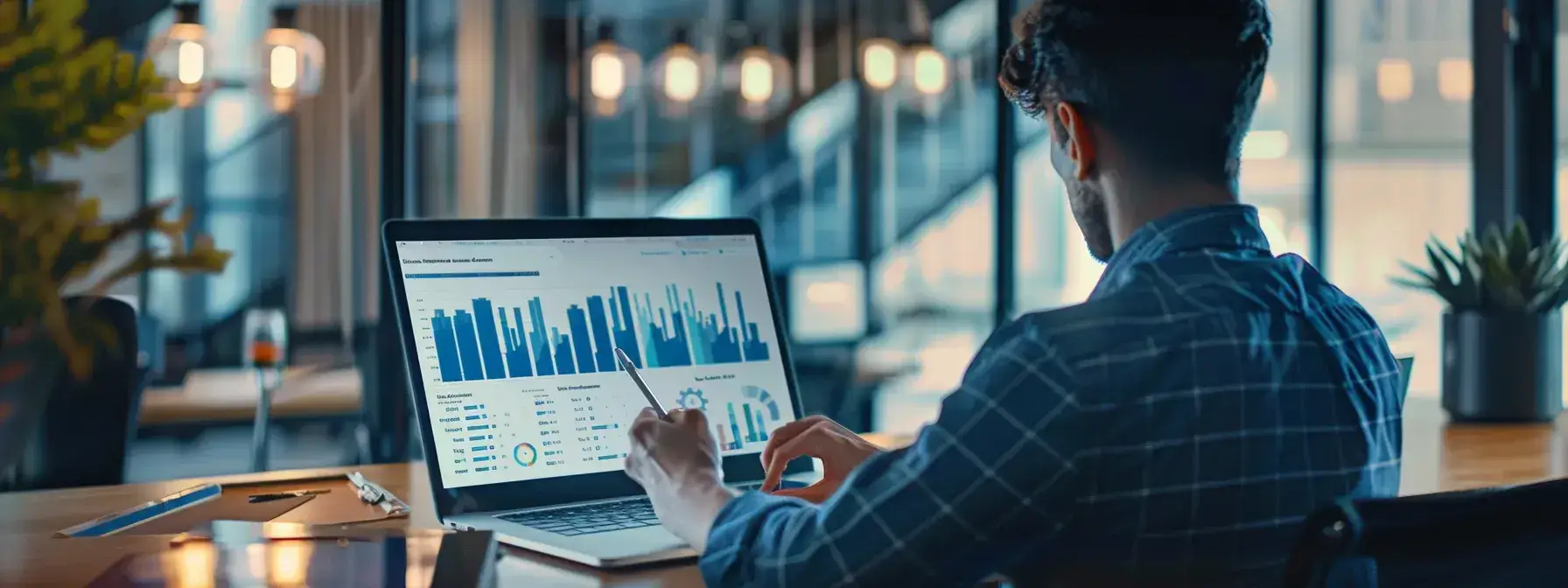 an engaged professional analyzes insightful data on a sleek laptop in a modern office, surrounded by vibrant analytics visuals that emphasize conversion rates and user behavior metrics on a projector screen.