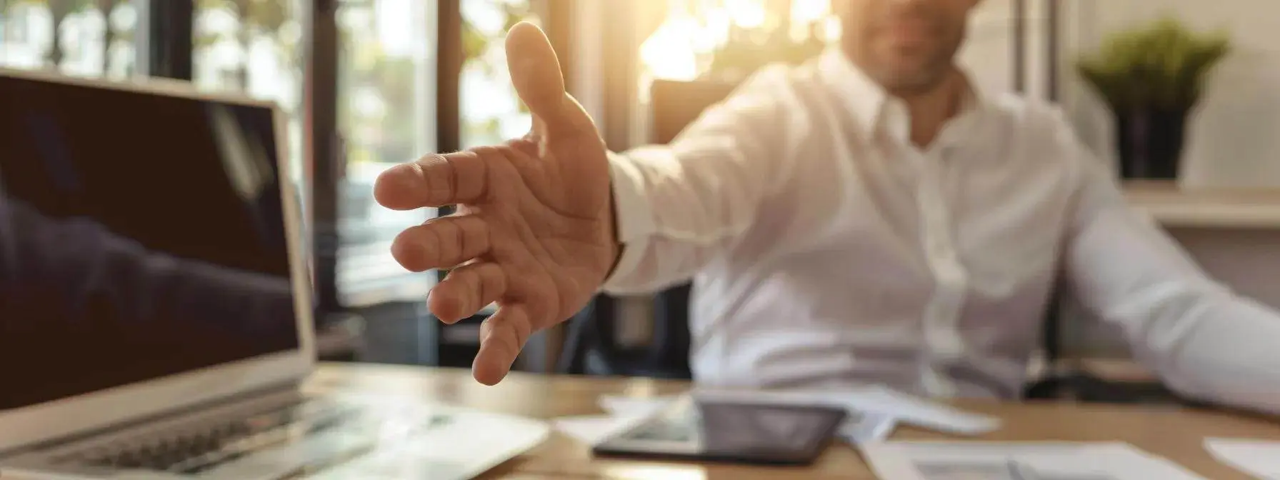 a focused seo specialist reaching out for guest posting opportunities in a modern office setting. a focused seo specialist reaching out for guest posting opportunities in a modern office setting.