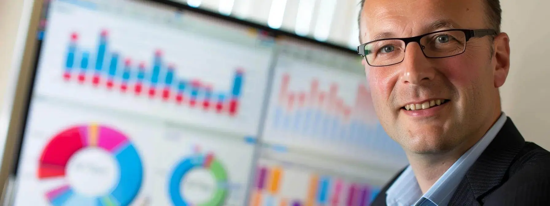 an seo specialist analyzing graphs and data charts to measure the impact of low-hanging fruit keywords on seo success. an seo specialist analyzing graphs and data charts to measure the impact of low-hanging fruit keywords on seo success.