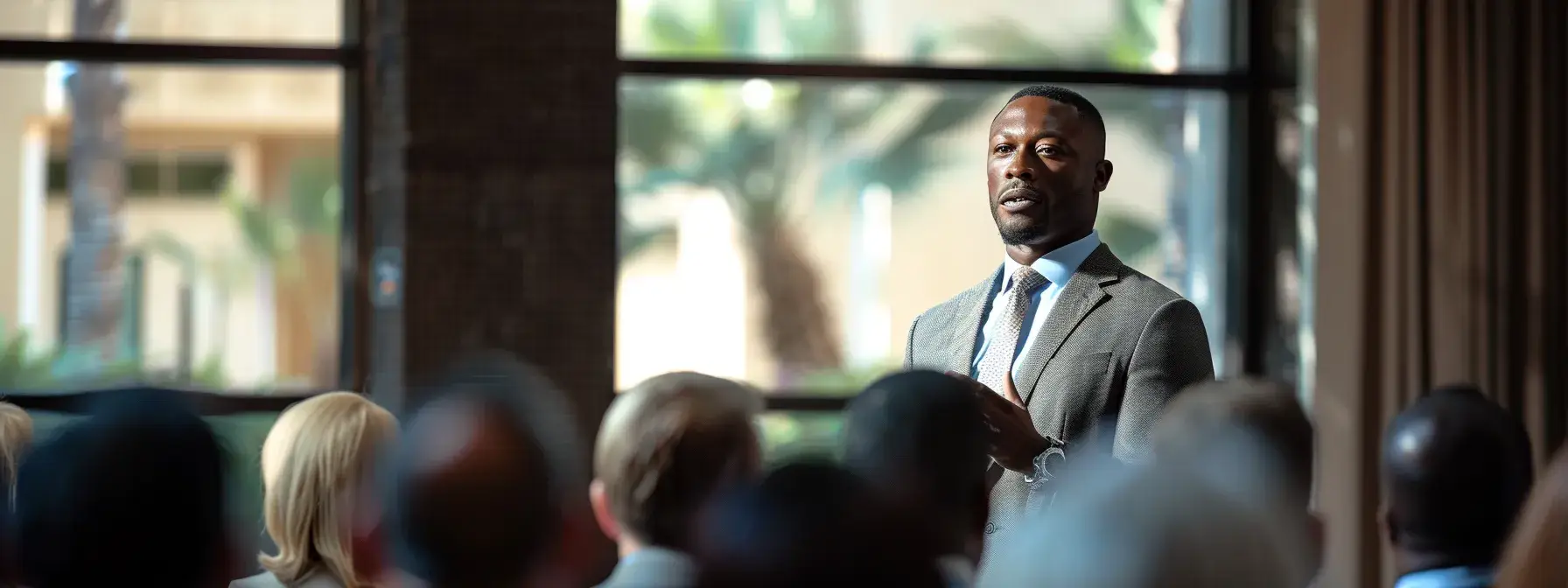 a confident real estate investor delivering a compelling guest blog post to a captivated audience. a confident real estate investor delivering a compelling guest blog post to a captivated audience.