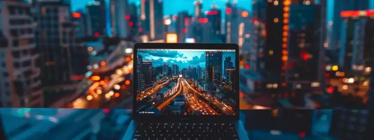 a laptop displaying a stunning aerial view of a bustling cityscape with skyscrapers and traffic, representing successful guest blogging as a key element in an effective rei seo strategy.